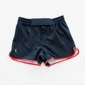 L* Shorts With Red Trim.